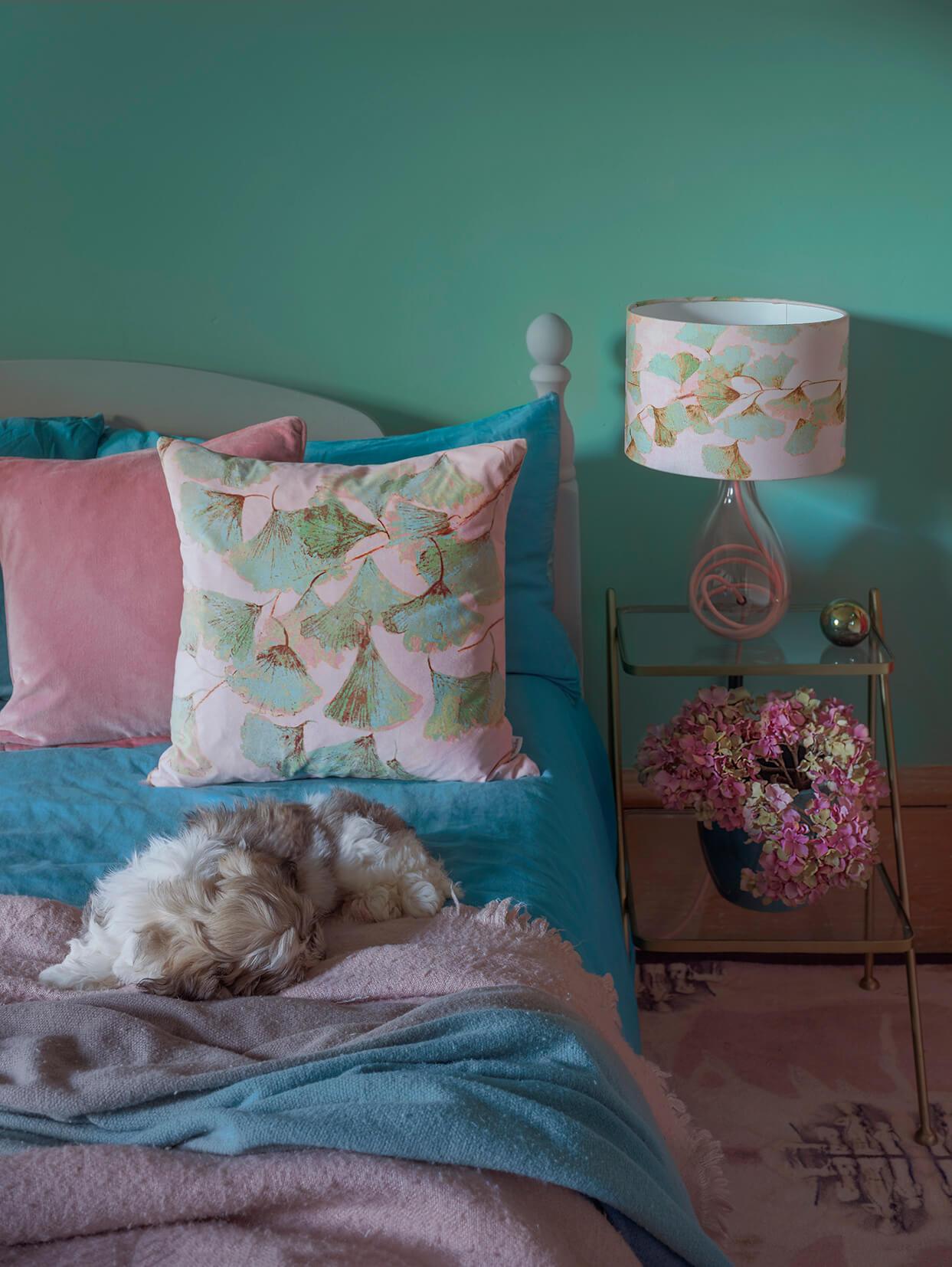 Jade and pink velvet cushion - Ginkgo in Jade glass lamp on Rose flex - designed by Anna Jacobs, in a bedroom lifestyle setting