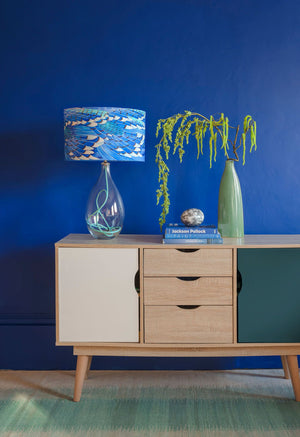 Blue Jay Wing lamp with Jade flex by Anna Jacobs in a lifestyle setting