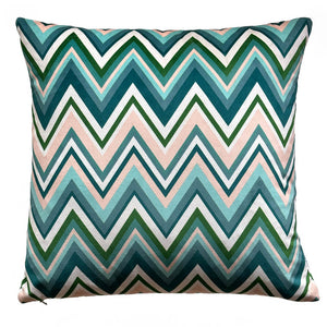 Blue, green and plaster pink zig zag velvet cushion by artist Anna Jacobs - cut out on white background