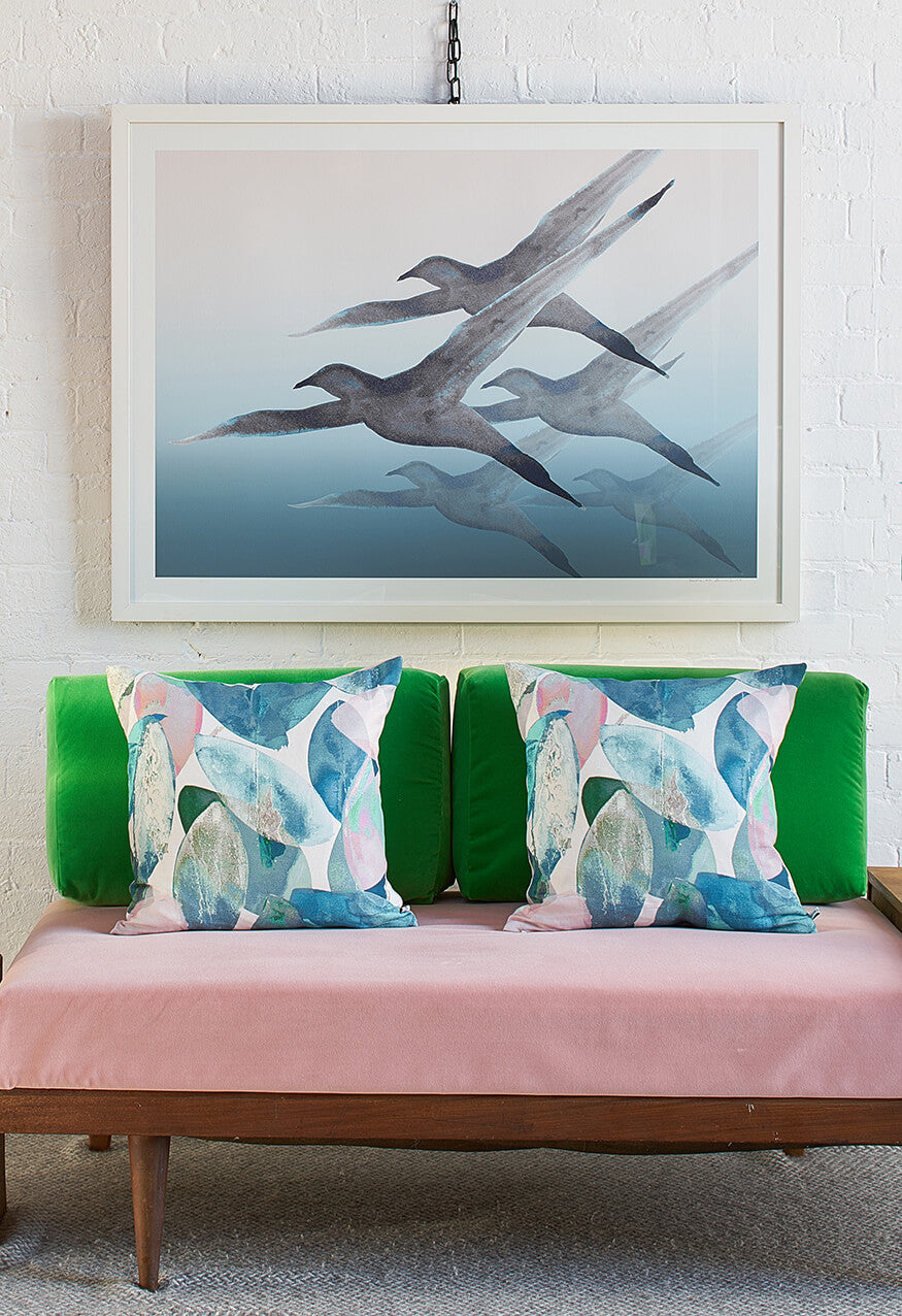 Breathe print by British artist, Anna Jacobs. A flock of seagulls flying through the misty sea air, painted in ink on watercolour paper