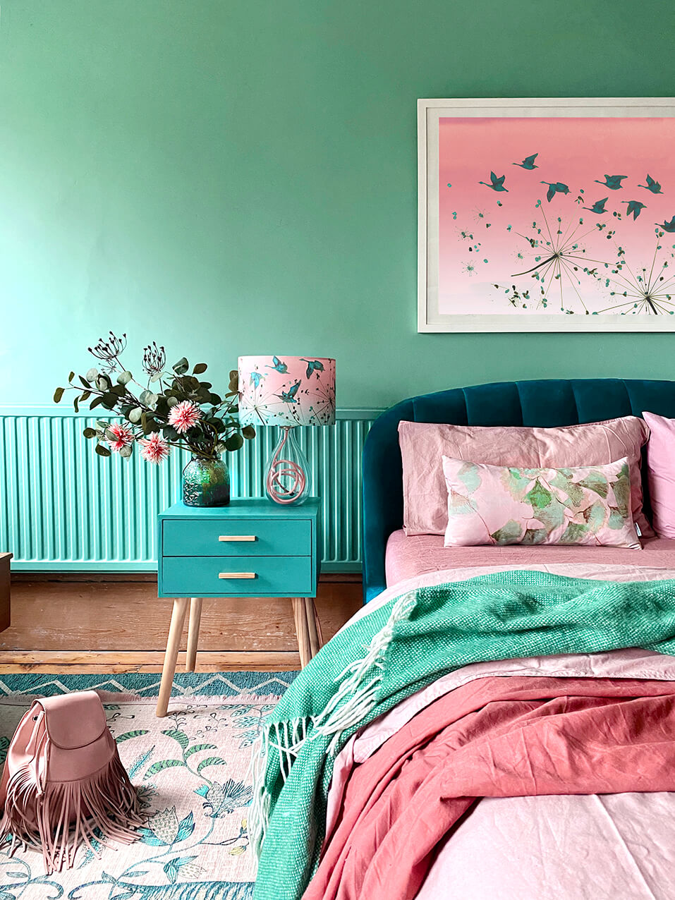 Green geese and seed heads flying across pink dusk sky - print by Anna Jacobs