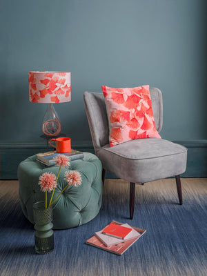 Ginkgo in Coral lamp on Rose flex glass lamp base and Ginkgo in Coral velvet cushion designed by Anna Jacobs